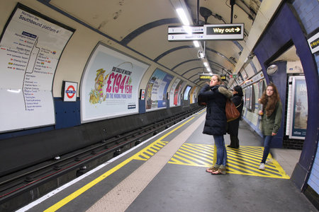 LONDON, UK - MAY 15, 2012: People wait at Camden Town underground station in London. London Underground is the 11th busiest metro system worldwide with 1.1 billion annual rides.のeditorial素材