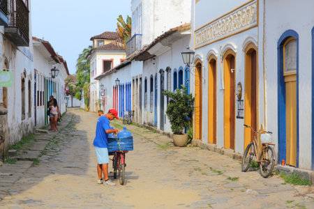 PARATY, BRAZIL - OCTOBER 14, 2014: People walk in the Old Town of Paraty (state of Rio de Janeiro). The colonial town dates back to 1667 and is considered for inclusion on UNESCO World Heritage List.のeditorial素材
