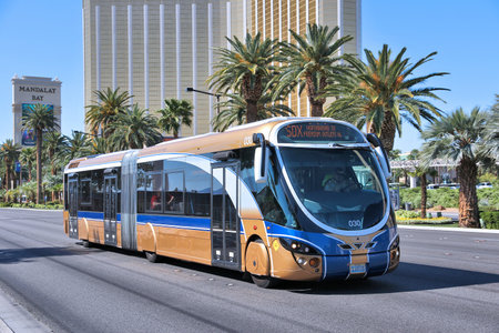 LAS VEGAS, USA - APRIL 14, 2014: People ride SDX bus in Las Vegas. SDX is operated by Wright...