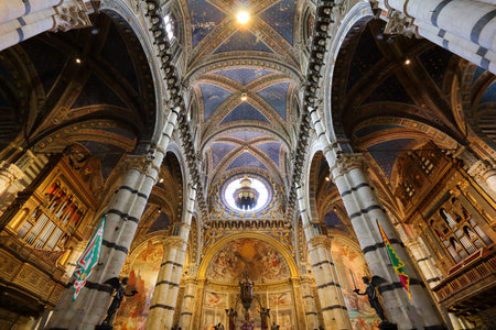 SIENA, ITALY - MAY 3, 2015: Interior view of the Cathedral in Siena, Italy. The Medieval Roman Catholic cathedral was consecrated circa year 1215.のeditorial素材