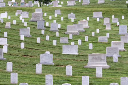 WASHINGTON, USA - JUNE 13, 2013: Arlington National Cemetery in Washington. Arlington National Cemetery was established in 1864 and has more than 400,000 graves.のeditorial素材