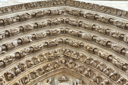 Paris, France - famous Notre Dame cathedral facade saint statues.のeditorial素材
