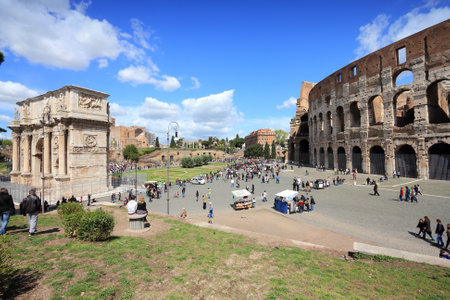 ROME, ITALY - APRIL 8, 2012: People visit Colosseum in Rome. According to official data Rome was visited by 12.6 million people in 2013.のeditorial素材