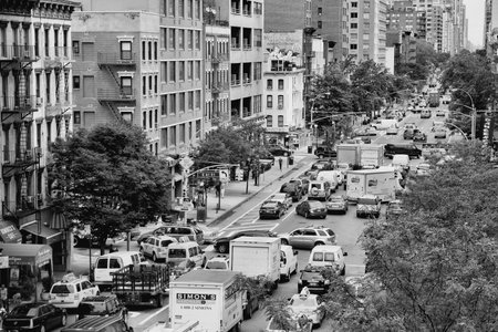 NEW YORK, USA - JULY 3, 2013: People drive in heavy traffic along 1st Avenue in New York. In 2009 average American spent 34 hours in traffic jams.のeditorial素材