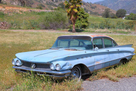 SPRINGVILLE, UNITED STATES - APRIL 12, 2014: 1960 Buick Invicta parked in Springville, California. The car manufacturer Buick dates back to 1903.のeditorial素材