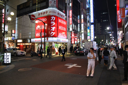 TOKYO, JAPAN - APRIL 13, 2012: People visit Yaesu neighborhood in Tokyo. Tokyo is the capital city of Japan, 35 million people live in its urban area.のeditorial素材