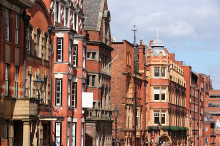 Birmingham, UK - street view with old brick townhouse architecture.のeditorial素材