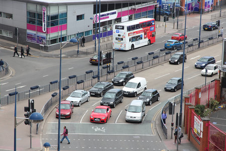 BIRMINGHAM, UK - APRIL 19, 2013: People drive cars in Birmingham, UK. Birmingham is the most populous British city outside London with 1.07 million residents.のeditorial素材