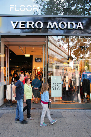 BERLIN, GERMANY - AUGUST 27, 2014: People visit Vero Moda fashion store at Tauentzienstrasse in Berlin. Vero Moda is part of Bestseller group. The company has 5,700 retail store.のeditorial素材