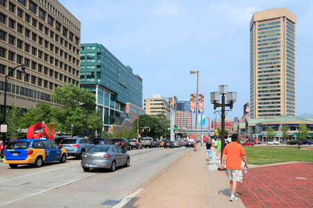 BALTIMORE, USA - JUNE 12, 2013: People visit downtown Baltimore. Baltimore is the largest city in the state of Maryland with 622,104 people.のeditorial素材