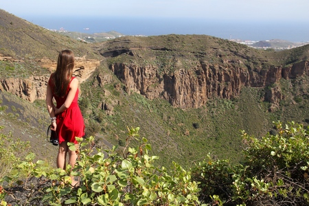 Female tourist visits Gran Canaria - landscape of Caldera de Bandama.の写真素材