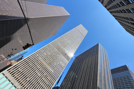 NEW YORK, USA - JULY 5, 2013: City view of 6th Avenue in New York. The avenue is also known as Avenue of the Americas and is major NYC thoroughfare.のeditorial素材
