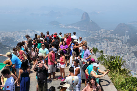 RIO DE JANEIRO, BRAZIL - OCTOBER 19, 2014: Overcrowded scenic overlook next to Christ the Redeemer in Rio de Janeiro. In 2013 1.6 million international tourists visited Rio.のeditorial素材
