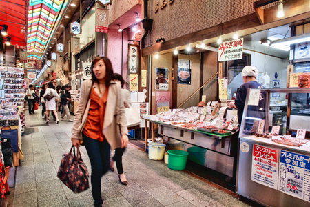 KYOTO, JAPAN - APRIL 19, 2012: People shop at Nishiki market in Kyoto, Japan. Retail market in Japan amounted to 832.6 billion in 2011.のeditorial素材