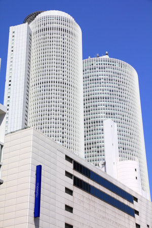 NAGOYA, JAPAN - APRIL 28, 2012: JR Central Towers building in Nagoya, Japan. It is the headquarters of Central Japan Railway Company and is the 8th tallest building in Japan.のeditorial素材