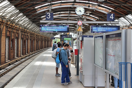 BERLIN, GERMANY - AUGUST 27, 2014: People wait at Hackescher Markt S-Bahn railway station in Berlin. Berlin S-Bahn serves 440 million annual rides (2013).のeditorial素材