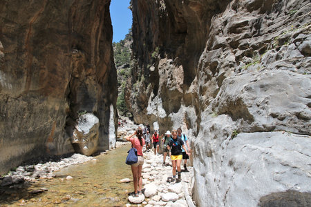 SAMARIA, GREECE - MAY 21, 2014: Tourists hike in Samaria Gorge in Crete, Greece. The national park is a UNESCO Biosphere Reserve since 1981.のeditorial素材