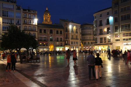 MALAGA, SPAIN - OCTOBER 4, 2014: People visit Old Town in Malaga, Spain. According to UNWTO Spain was visited by 68.2 million tourists in 2015.のeditorial素材