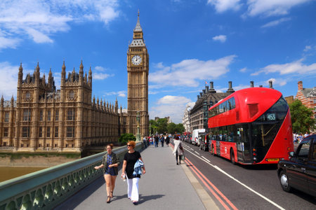 LONDON, UK - JULY 7, 2016: People walk near Big Ben in London, UK. London is the most populous city...