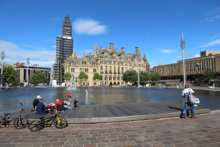 BRADFORD, UK - JULY 11, 2016: People visit Centenary Square in Bradford, UK. Bradford is one of largest cities in Yorkshire with population of 528,155.のeditorial素材