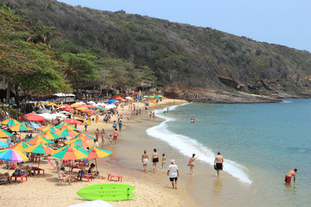 BUZIOS, BRAZIL - OCTOBER 16, 2014: People visit Joao Fernando beach in Buzios, state of Rio de Janeiro in Brazil. Brazil had 5.17 million visitors in 2012.のeditorial素材