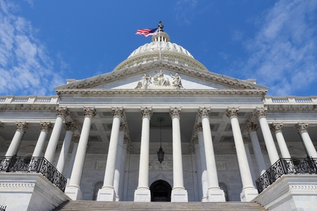 Washington DC, United States landmark. National Capitol building with US flag.