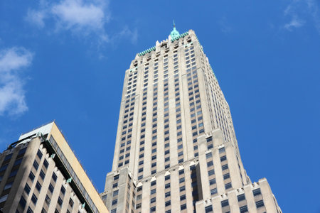 NEW YORK, USA - JULY 4, 2013: Trump Building skyscraper in New York. The 283m tall building is...