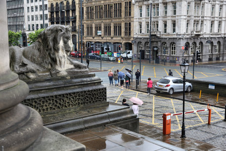 LEEDS, UK - JULY 11, 2016: People walk in front of City Hall in Leeds, UK. Leeds urban area has 1.78 million population.のeditorial素材