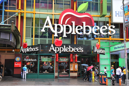 NEW YORK, USA - JULY 1, 2013: Applebee's restaurant at Times Square, New York. As of 2013 Applebee's had more than 2,000 locations of their grill and bar restaurants.のeditorial素材