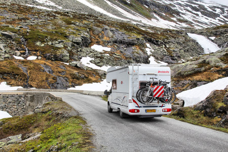 STRYN, NORWAY - JULY 19, 2015: People drive a camper van in Stryn, Norway. Norway had almost 5 million foreign visitors in 2011.のeditorial素材