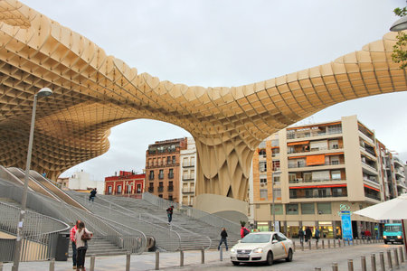SEVILLE, SPAIN - NOVEMBER 4, 2012: People visit Metropol Parasol building in Seville, Spain. Metropol Parasol claims to be the largest wooden structure in the world.のeditorial素材