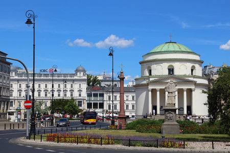 WARSAW, POLAND - JUNE 19, 2016: People visit Plac Trzech Krzyzy (Three Crosses Square) in Warsaw, Poland. Warsaw is the capital city of Poland. 1.7 million people live here.のeditorial素材