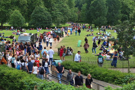 LONDON, UK - JULY 9, 2016: People enjoy summer in Green Park in London. Green Park is one of the Royal Parks of London.のeditorial素材
