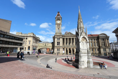 BIRMINGHAM, UK - APRIL 19, 2013: People visit Chamberlain Square in Birmingham. Birmingham is the...