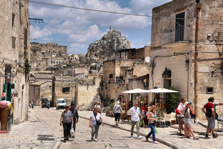 MATERA, ITALY - JUNE 4, 2017: People visit Sassi districts in Matera, Italy. The Old Town is listed as a UNESCO World Heritage Site.のeditorial素材
