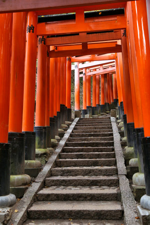 KYOTO, JAPAN - NOVEMBER 28, 2016: Torii gates of Fushimi Inari Taisha shrine in Kyoto, Japan. There are more than 10,000 torii gates at Fushimi Inari.のeditorial素材