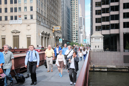 CHICAGO, USA - JUNE 26, 2013: People walk the Lyric Opera Bridge at Madison Street in Chicago. It is one of Chicago's 37 operable movable bridges.のeditorial素材