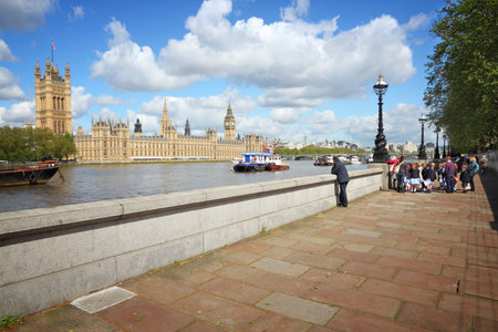 LONDON, UK - MAY 15, 2012: People visit Thames Embankment in London. London is the most populous city and metropolitan area of the European Union with 9,787,426 people in 2011.のeditorial素材