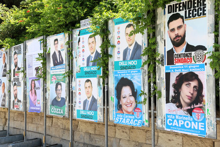 LECCE, ITALY - JUNE 1, 2017: Political candidates posters in Lecce, Italy. Lecce had its municipal elections in June 2017.のeditorial素材