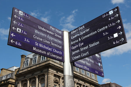 LIVERPOOL, UK - APRIL 20, 2013: Direction signs to landmarks of Liverpool, UK.のeditorial素材