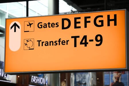 Generic airport signage in Amsterdam. Illuminated gates sign.の写真素材
