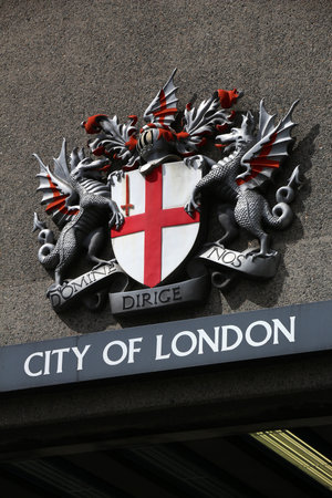 LONDON, UK - JULY 9, 2016: Coat of arms of City of London on a bridge in London.のeditorial素材