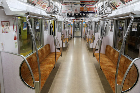 TOKYO, JAPAN - NOVEMBER 30, 2016: Empty metro train in Tokyo. With more than 3.1 billion annual passenger rides, Tokyo subway system is the busiest worldwide.のeditorial素材