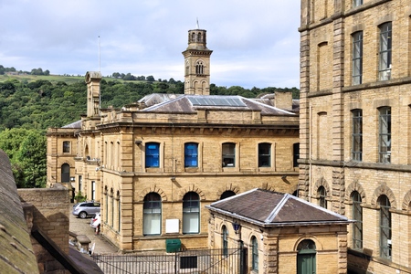Saltaire former textile mill (Salts Mill) in Victorian model village in Shipley (England) listed as UNESCO World Heritage Site.の写真素材
