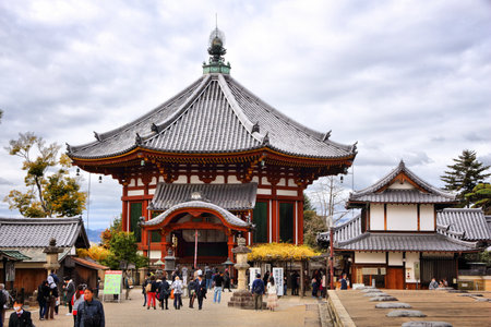 NARA, JAPAN - NOVEMBER 23, 2016: Tourists visit Kofuku-ji temple in Nara, Japan. The temple is part of Nara's UNESCO World Heritage Site.のeditorial素材