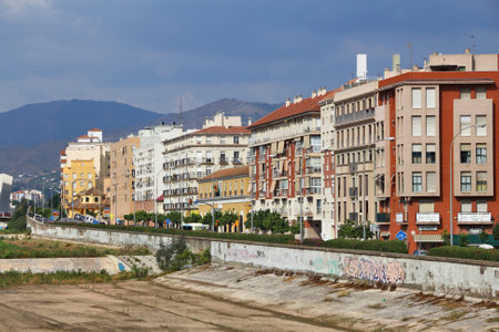 MALAGA, SPAIN - OCTOBER 4, 2014: Guadalmedina river canal in Malaga, Spain. According to UNWTO Spain was visited by 68.2 million tourists in 2015.のeditorial素材