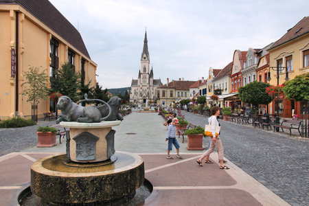 KOSZEG, HUNGARY - AUGUST 10, 2012: People visit Fo Ter (Fo Square) in Koszeg, Hungary. In 2011 tourism receipts in Hungary brought 4.03 billion EUR to national economy.のeditorial素材
