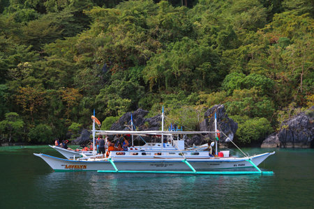 PALAWAN, PHILIPPINES - DECEMBER 1, 2017: People enjoy island hopping tour in Palawan, Philippines. 6 million foreign tourists visited Philippines in 2016.のeditorial素材