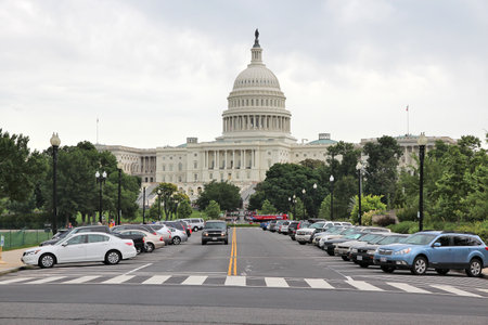 WASHINGTON, USA - JUNE 13, 2013: Street to the US Capitol in Washington DC. 18.9 million tourists visited capital of the United States in 2012.のeditorial素材