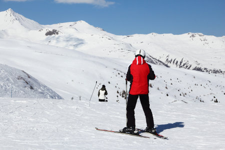 VALLOIRE, FRANCE - MARCH 23, 2015: Skiers enjoy the snow in Galibier-Thabor station in France. The station is located in Valmeinier and Valloire and has 150km of ski runs.のeditorial素材